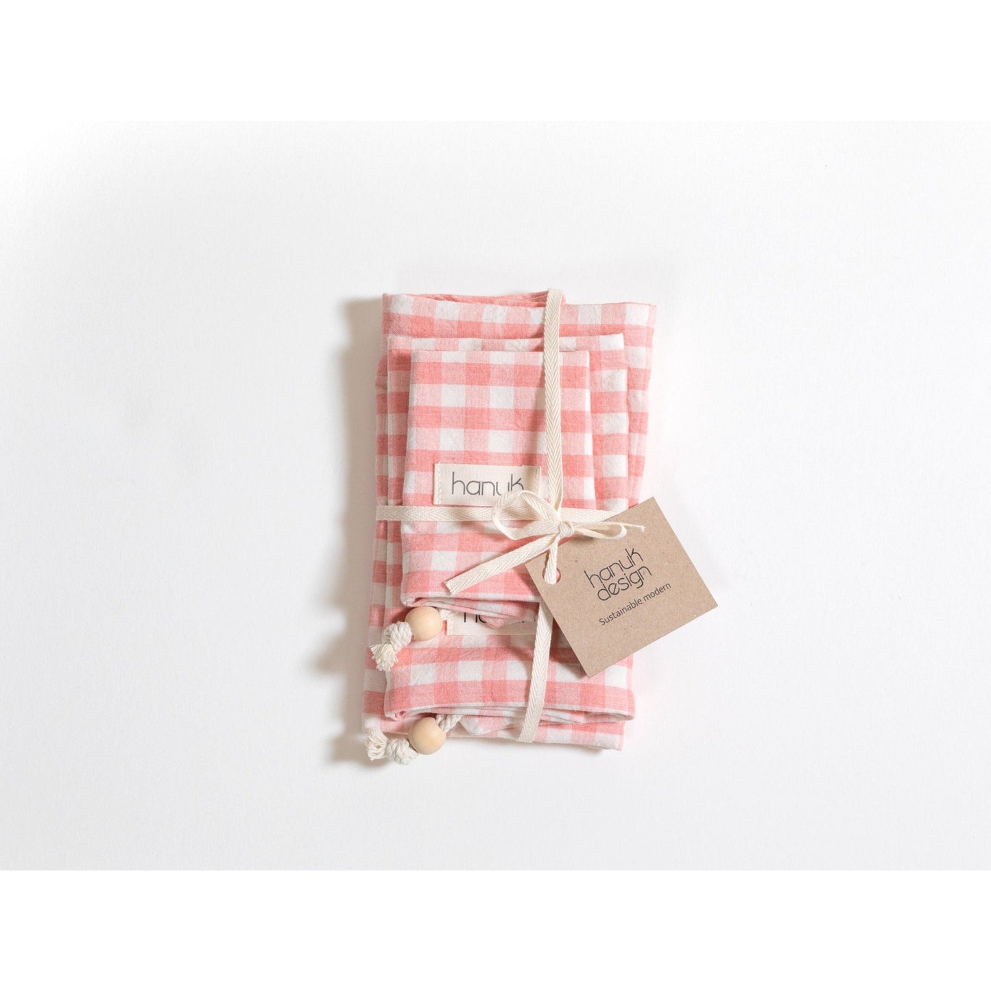 Pink checked bags for gifts and produce.