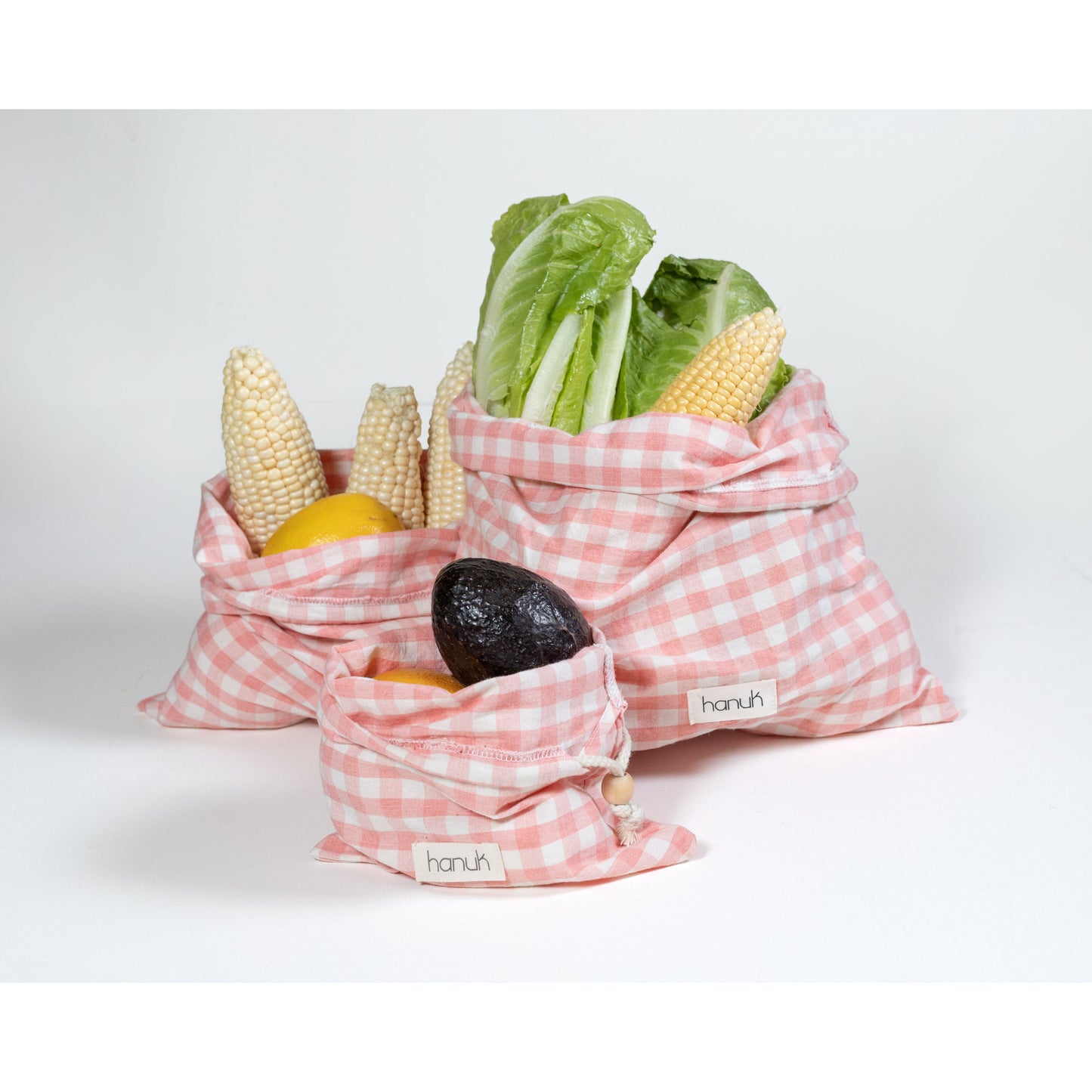 pink reusable produce bags. gift bags. travel bags.